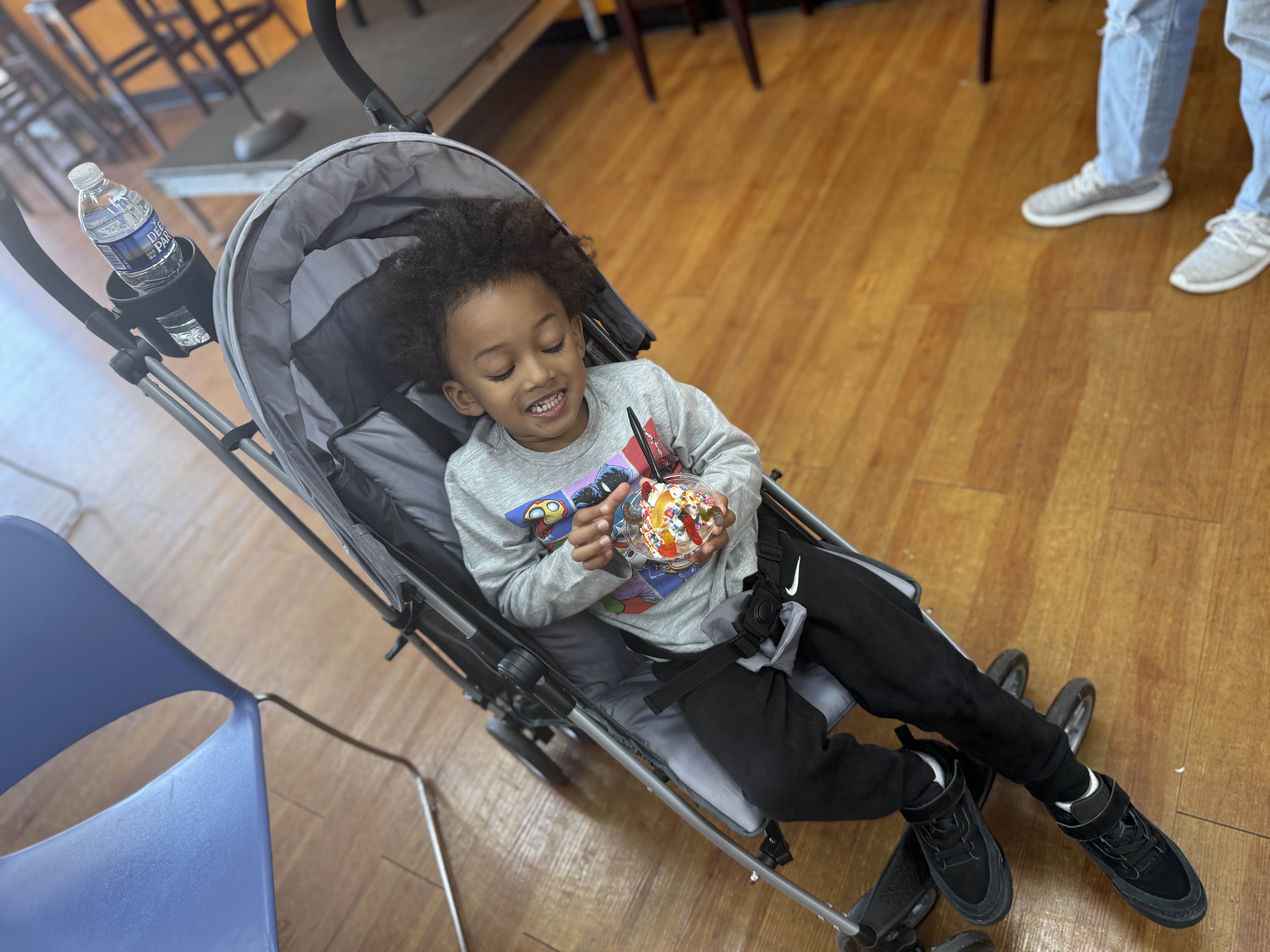 Kid enjoying Cool J's sundae